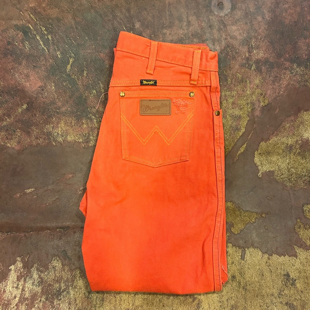 Dyed coral orange bootcut wranglers